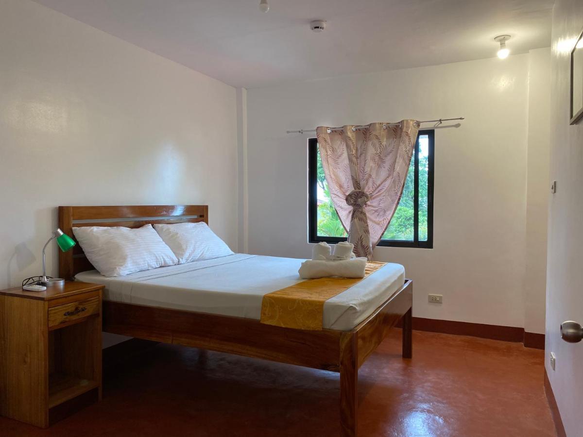 Tongatok Cliff Resort Мамбахао Экстерьер фото